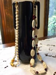 Left - 19" white veined Agate stones with 2 Lamp-work centers $53.00  Right - 21" veined-Agate with red stone inserts $58.00